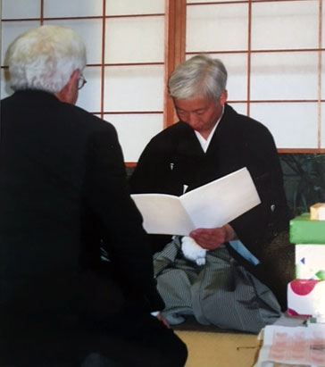 frager receiving 7 dan